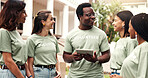Smile, man and people with tablet for volunteering, sign up and appoint task of community outreach. Happy, coordinator and team with digital for charity, participation and job allocation for welfare