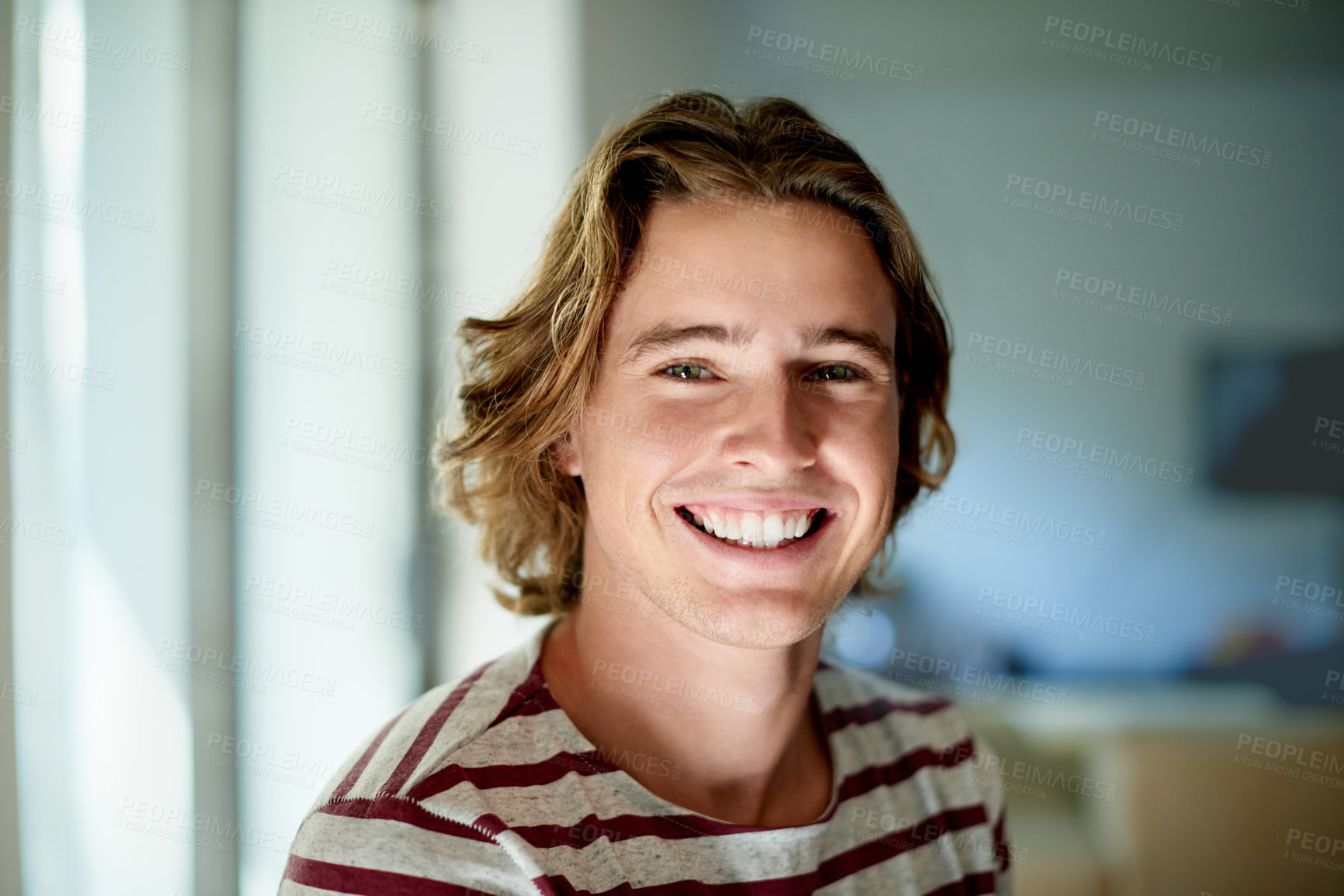 Buy stock photo Man, student and happy with portrait, home and pride with confidence, vacation and semester break. Gen z person, smile and face in living room, relax and rest on holiday at apartment in Germany