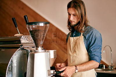 Buy stock photo Barista, man and prepare coffee with machine for customer service, grinding beans or morning brew in startup. Cafe, waiter and making latte beverage, espresso and process order in small business