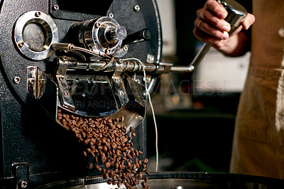 Buy stock photo Coffee, beans and person with roast machine for fresh brew, granules and caffeine production. Restaurant, espresso and hands of worker with grinder to prepare for beverage, latte and cappuccino