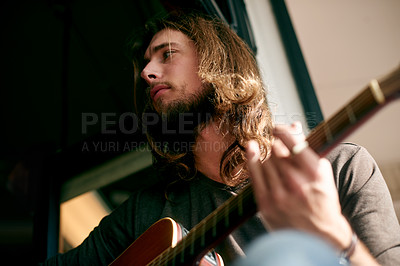 Buy stock photo Artist, playing and man with guitar in home with tuning instrument, performance or practice. Creative, rehearsal and male person with acoustic strings for song with talent, hobby or activity in house