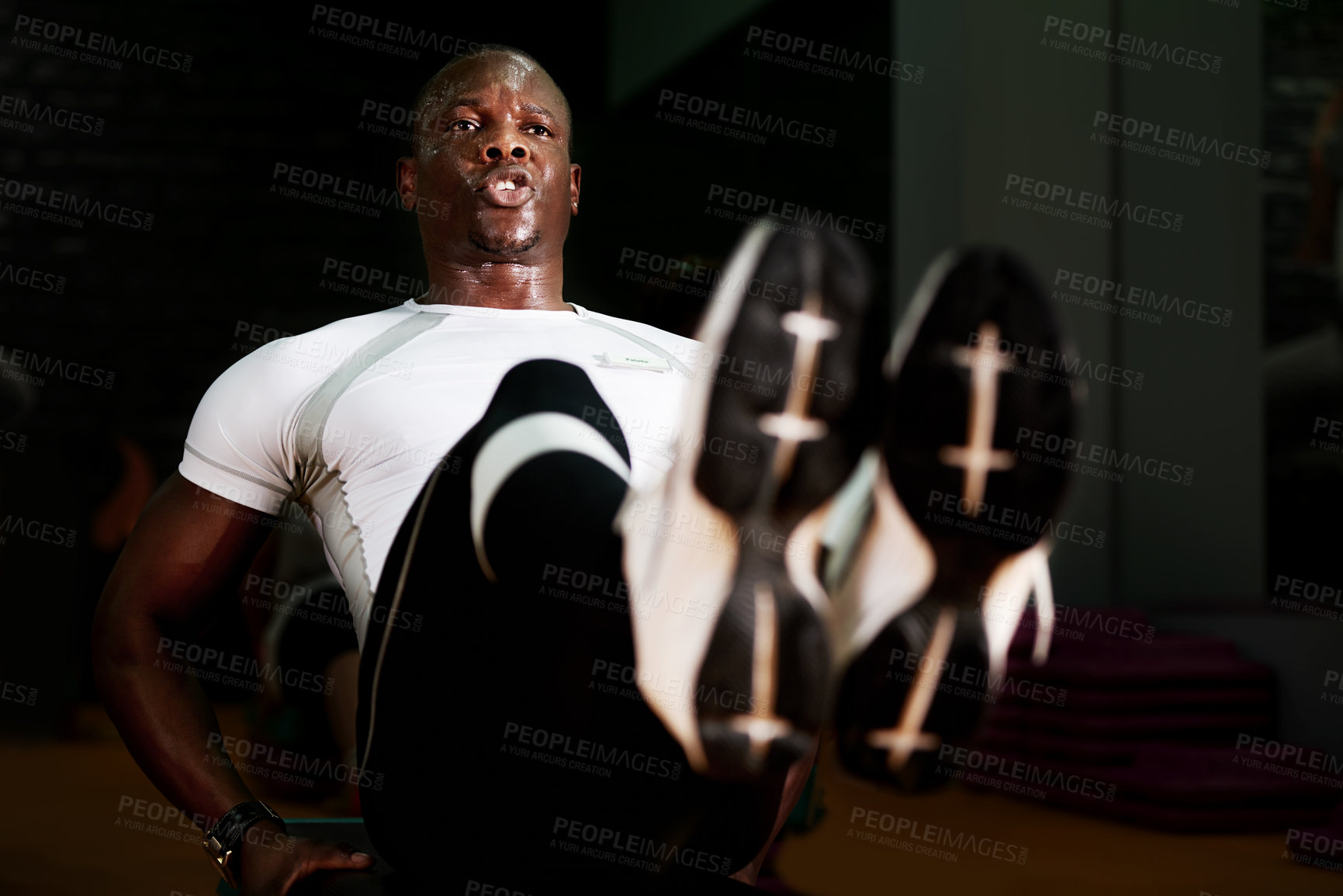 Buy stock photo Fitness, sweating or black man with sit ups in gym for health, body wellness or core workout. Crunches, intense and athlete training abdomen muscle for vitality, energy and abs for growth challenge