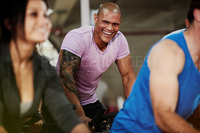 Buy stock photo Excited, spin class or man on cycling bike in training and exercise for wellness, health or fitness. Athlete, happy or active people on bicycle machine for workout, body or challenge in gym community