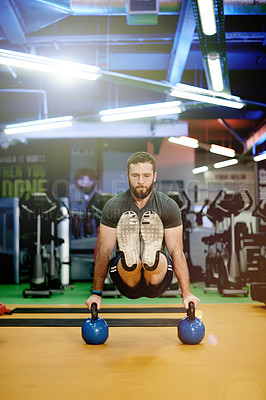 Buy stock photo Gym, man and kettlebell fitness for exercise, power and sports challenge for muscle. Balance, bodybuilder and heavy weights for training with health club, workout and athlete for wellness routine