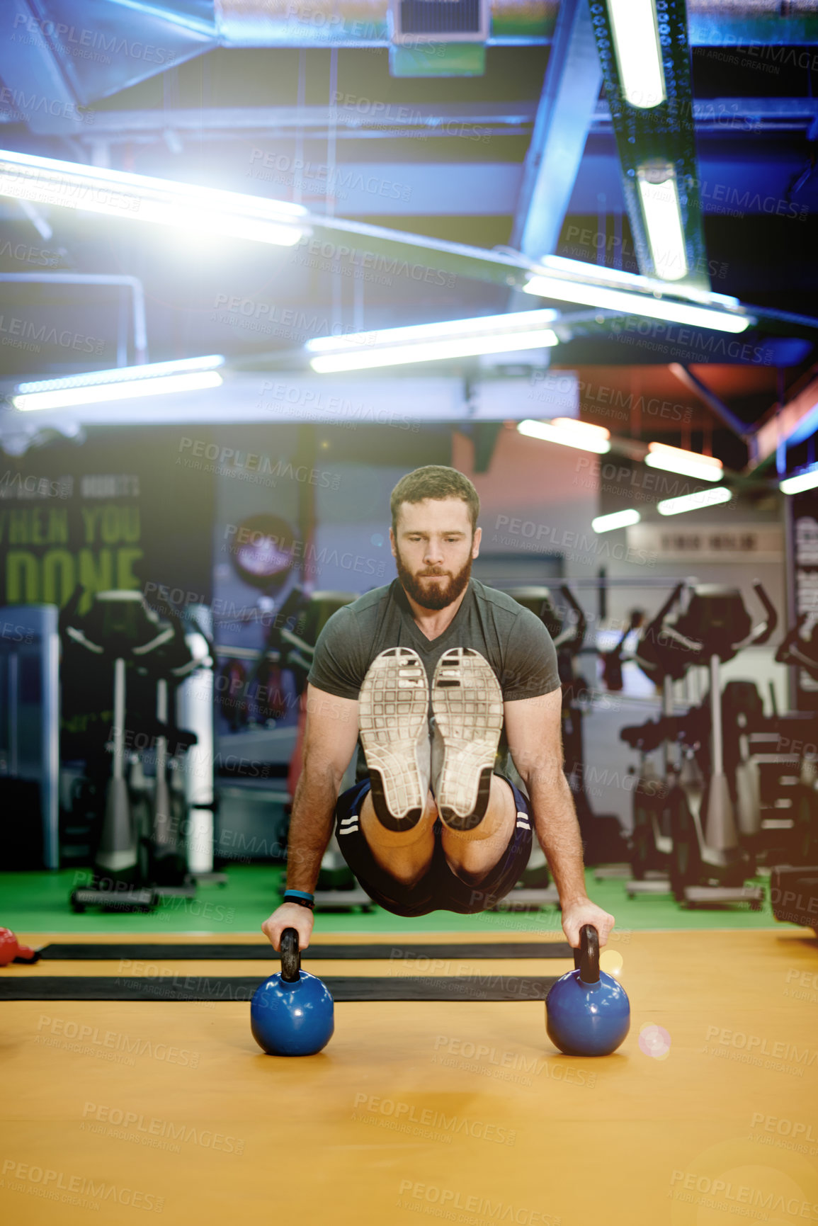 Buy stock photo Gym, man and kettlebell fitness for exercise, power and sports challenge for muscle. Balance, bodybuilder and heavy weights for training with health club, workout and athlete for wellness routine