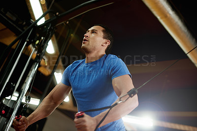 Buy stock photo Fitness, training and equipment with man in gym for cable pulley machine, muscle and workout. Health, intense exercise and bodybuilder with person in sports club for weightlifting, strong and athlete