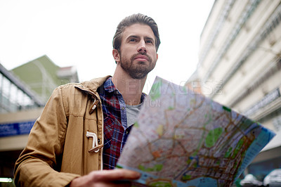 Buy stock photo Street, man or thinking in city for map, tourism journey or planning travel in outdoor navigation. Check, location and male person with destination to explore on adventure in urban town for direction