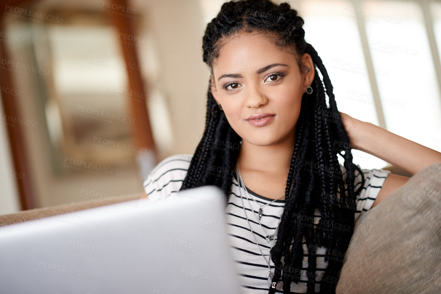 Buy stock photo Portrait, student and laptop with woman on sofa for scholarship application, reading and online course. College tuition, financial aid and University credits with person in living room of home