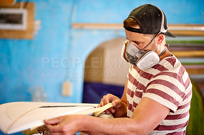 Buy stock photo Manufacturing, man and tape on surfboard in workshop for production process, design or measurement. Surf, factory and person with creative tools for protection, masking and repair with reinforcement