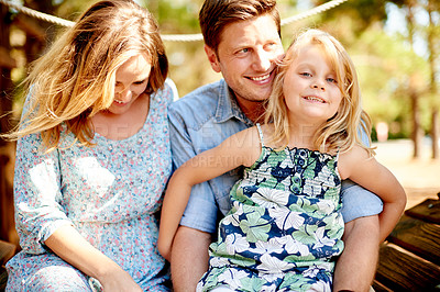 Buy stock photo Outdoor, parents and girl in nature with smile, love and bonding together on weekend break. Portrait, support and family in backyard, connection and happy relationship in sunshine adventure.