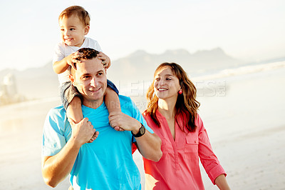 Buy stock photo Happy, parents or baby on shoulder at beach for travel adventure, holiday break or bonding. Family support, trust or dad carry child on seashore for weekend trip, vacation getaway or walking together