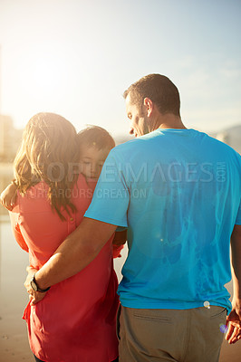 Buy stock photo Back, flare and parents with child at beach, sleepy toddler and family vacation with travel. Adventure, summer and sunshine with man, woman and kid outdoor for fresh air, relationship and bonding