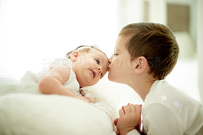 Buy stock photo Home, kiss and brother with sister, love and bonding together with relationship. Mockup space, kids and siblings in bedroom, family and smile with happiness, care and children with affection or relax