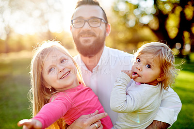 Buy stock photo Family, dad and bonding with children, park or man with girls, point and scenery on summer vacation. Outdoor, father and break with daughters, bokeh and flare on holiday, love and affection in nature