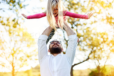 Buy stock photo Dad, girl and airplane with play at park, lift and happy family by trees, nature and bonding in summer. People, father and child with flight, games and excited with smile outdoor in New Zealand