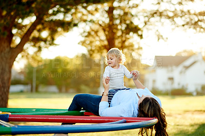 Buy stock photo Outdoor, playing and child with smile, playground and love for daughter in nature or happy with girl. Game, woman and break with toddler on weekend, family and childcare on holiday, park and fun