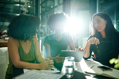 Buy stock photo Talking, group and women with tablet, office or collaboration for marketing strategy or ad campaign. Night, colleagues or people with tech for deadline, flare and planning for project or working late