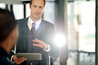 Buy stock photo Man, meeting and tablet with presentation at office, discussion or team for review at insurance agency. Person, speaker and tech in boardroom for feedback, application and happy for talk at company