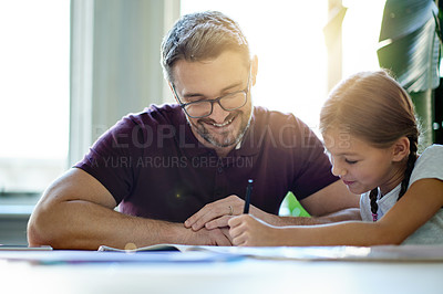 Buy stock photo Learning, education and father with child for homework in house for help, studying or project. Smile, teaching and dad with girl kid student for working on academic assignment together in apartment.
