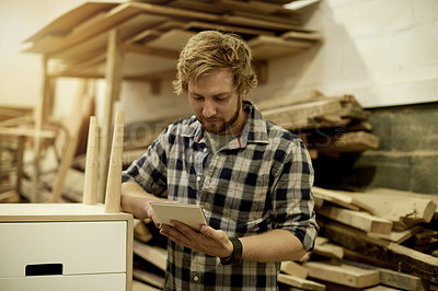 Buy stock photo Woodwork, tablet and man in small business for manufacturing, carpentry or production process. Research, building tips and creative carpenter in workshop for craft, industrial trade and manual labor
