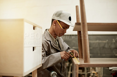 Buy stock photo Carpenter, man and furniture measurement for production, manufacturing or fix in workshop. African person, creative and tape for woodwork, repair or joinery process in industrial factory with tools
