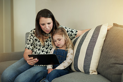 Buy stock photo Happy, woman or child on couch with tablet, watching or learning for educational video. Smile, pregnant mother or daughter in living room with tech, mobile app or connection for childhood development