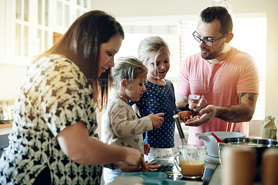 Buy stock photo Baking, help and learning with family in kitchen for support, cooking and baker dessert recipe. Teaching, bonding and food with parents and children in home for cupcake, love and growth together