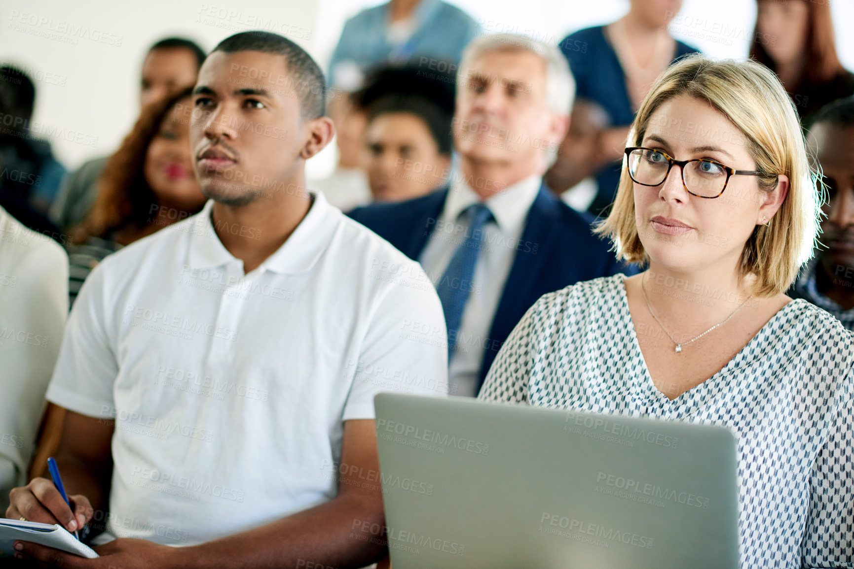 Buy stock photo Business, audience and woman at conference, laptop and listening with skills development for trading. Group, employees and people in seminar, pc and learning with financial workshop and convention