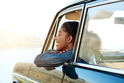 Buy stock photo Happy, laugh and woman in car window for road trip, adventure and journey in countryside. Thinking, relax and African person in vehicle for holiday, vacation and travel for weekend getaway in nature