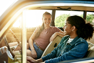 Buy stock photo Happy women, friends and relax with car for road trip, holiday or outdoor vacation together. Female people, laughing or smile with vehicle for travel journey, transportation or stop at destination