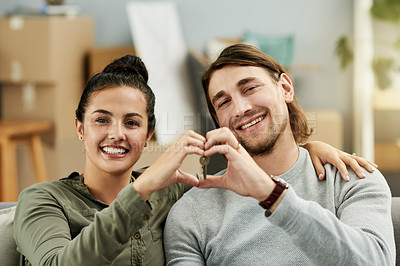 Buy stock photo New home, heart and portrait of couple with hands for property, moving and house purchase. Homeowner, real estate and man with woman with love emoji for mortgage, investment and rental apartment