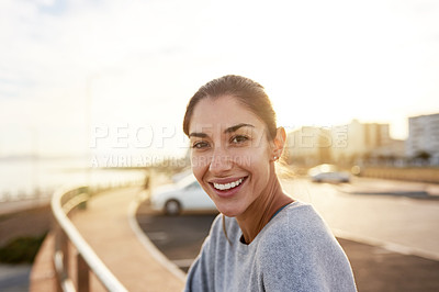 Buy stock photo Portrait, woman and happy for fitness in city of sports exercise, marathon training and workout rest. Female athlete, relax and practice with running competition, cardio progress and recovery outdoor