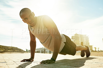 Buy stock photo Black man, fitness and pushup in city for exercise, workout and body weight training for health. Press up, sports and athlete outdoor for strong muscle, calisthenics and balance with core stability