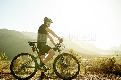 Buy stock photo Cycling, sports and man with fitness, bike and training with morning routine, cardio and wellness. Outdoor, bicycle or healthy person with performance challenge, endurance or competition with workout