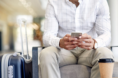 Buy stock photo Phone, hands and businessman in airport lounge for networking event, summit and convention. Flight schedule, mobile and person waiting with suitcase in lobby for international conference or travel