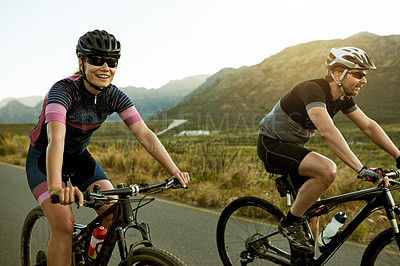 Buy stock photo Sports, cycling and exercise with couple in nature for race team, bike athlete or cardio workout. Triathlon training, fitness and bicycle with man and woman on countryside road for health and travel