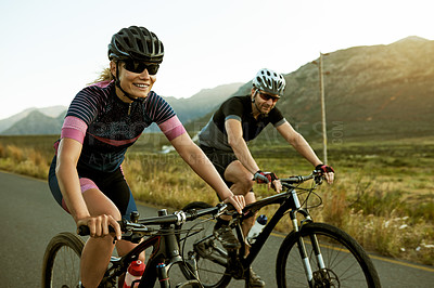 Buy stock photo Healthy, couple and cyclist with bicycle, road or active for wellness, fitness or helmet for safety. Cycling, athlete and people with eco friendly transport, nature and race with partner outdoor
