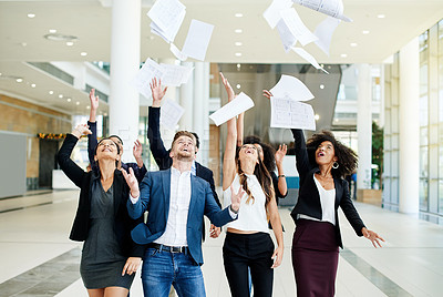 Buy stock photo Excited, business people or celebration with documents in air for corporate success or completion. Happy, group or employees throwing paperwork for achievement, done or finished together in workplace