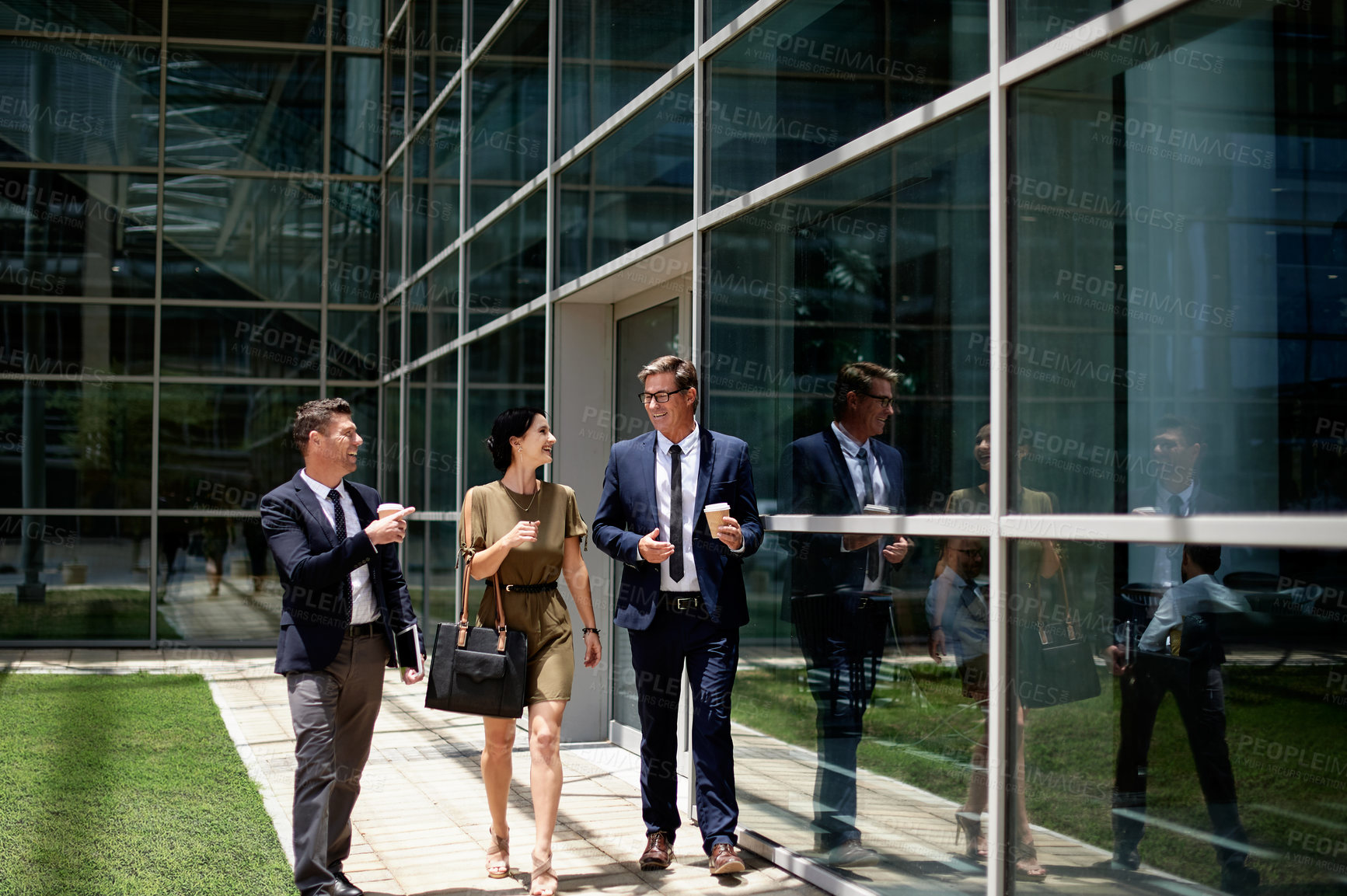 Buy stock photo Outdoor, communication or business people with smile by glass office, conversation or commute to work. Happy, coworkers or travel to job with discussion, friendship or commitment in corporate career.