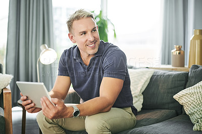 Buy stock photo Creative, thinking and man with tablet, home or plan for article to publish, reporter and freelance. Online, journalist and mature person with tech for story, reflection and smile for remote work
