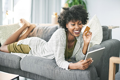 Buy stock photo Credit card, excited and black woman on tablet in home for online shopping, payment and digital order. Happy, sofa and person on tech with bank info for website sale, discount and ecommerce purchase