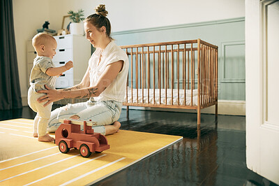 Buy stock photo Baby, mother and learning to walk in home, education or growth, bonding and playing. Development, care and mama teaching kid or newborn first steps, helping with balance or support in house nursery.