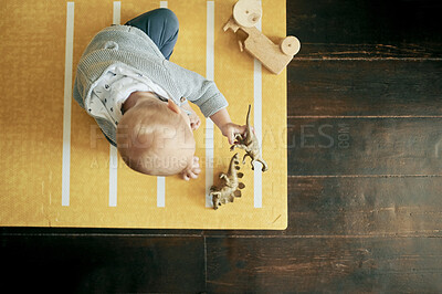 Buy stock photo Top view, toys and baby playing, fantasy and creative with activity, floor and happiness. Child, kid and toddler with dinosaur, game and imagination with fun, playful and development in home to relax