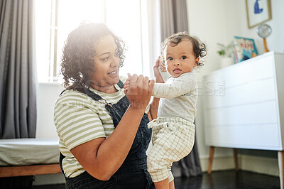 Buy stock photo Mother, family and baby holding hands in bedroom for love, care and development. Woman and curious boy child or toddler together for support, quality time and learning or playing for fun or games