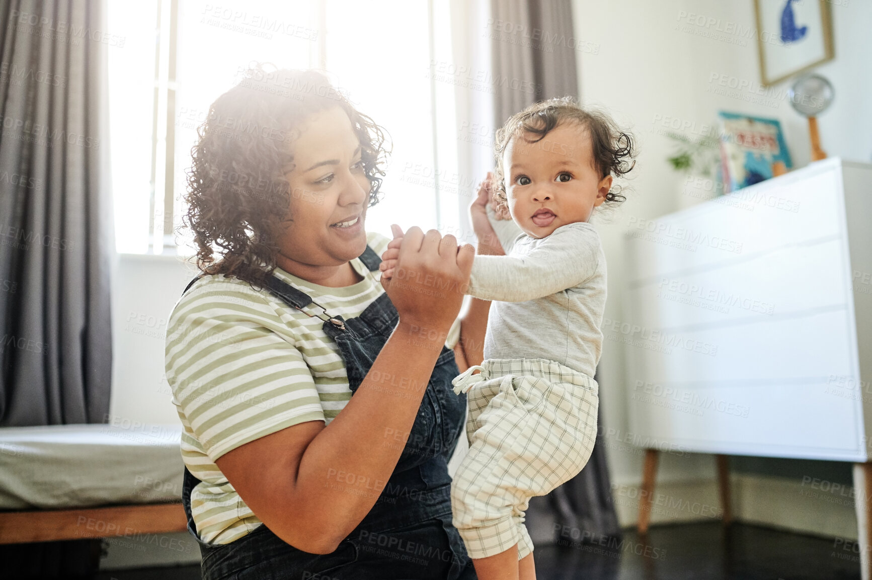 Buy stock photo Mother, family and baby holding hands in bedroom for love, care and development. Woman and curious boy child or toddler together for support, quality time and learning or playing for fun or games