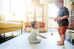 Baby, living room and children play with toys for bonding, quality time and child development at home. Family, siblings and happy kids playing with toys, building blocks and relax together on floor