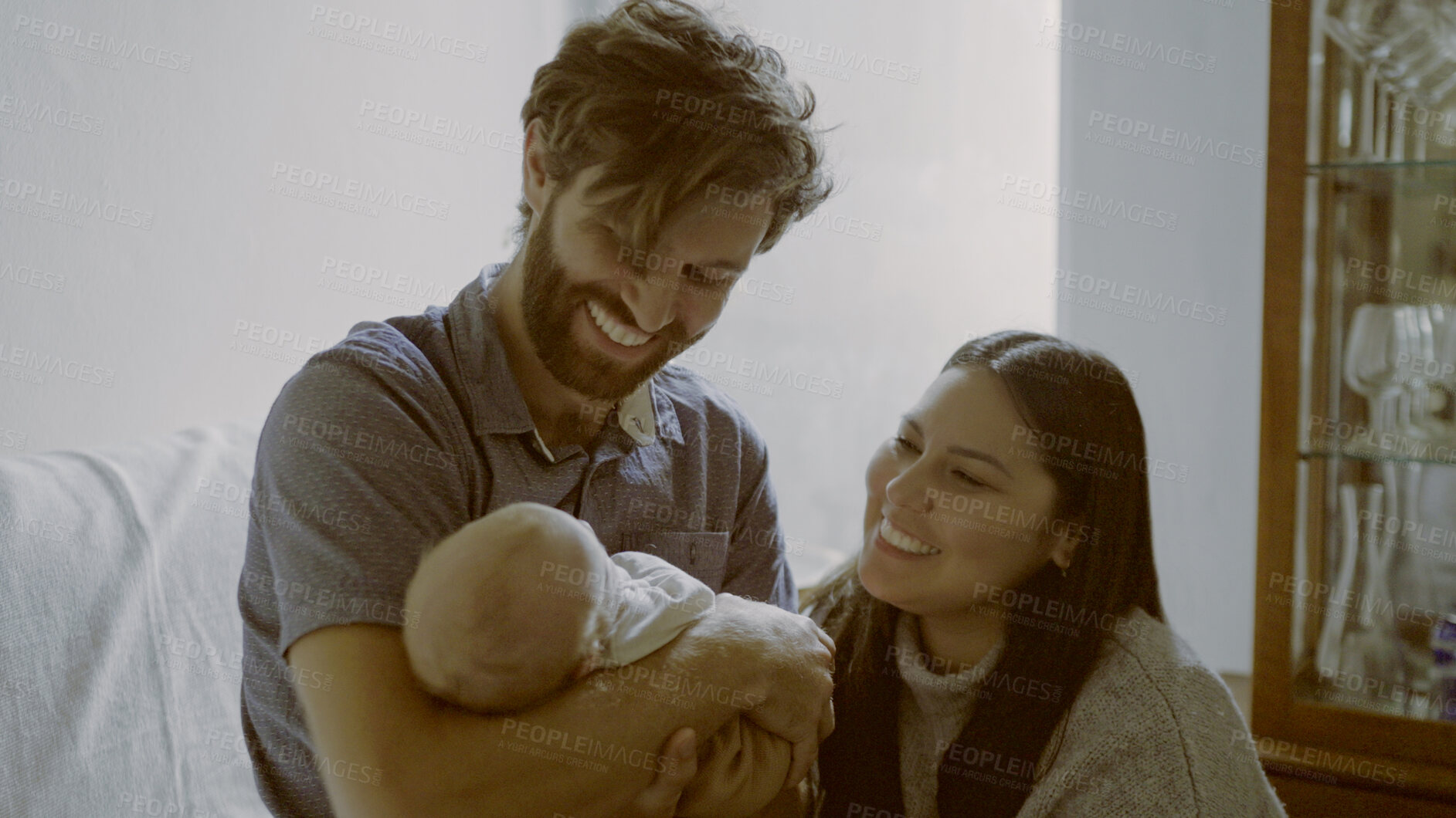 Buy stock photo Care, mother or father with baby in a happy family for love or bond together for child development. Smile, hug or proud dad with an excited mom or newborn infant for support, trust or comfort at home