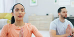 Couple, relax and meditation with namaste in home for mindfulness or spiritual awareness together. Calm, man and woman with breathing exercise or chakra for mental health, zen or wellness in house