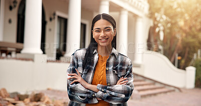 Buy stock photo Portrait, woman and student at campus with smile, exchange program and scholarship for education. Happy, person and arms crossed at university for degree, start semester and learning for knowledge