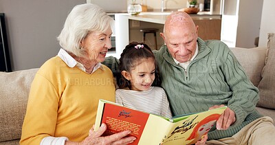 Buy stock photo Grandparents, reading and child with book in home, education or cognitive growth with fiction story. Family, old man and senior woman with literature, happy and kid with skill development in house